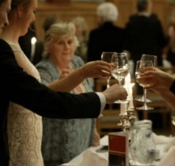 People toasting round a table
