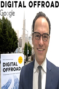 Head shot of Dr Ulf Bosch in front of Digital Offroad sign