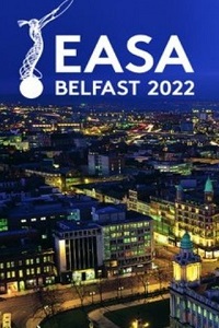 EASA BELFAST 2022 written in solid white ontop of a night time aerial view of Belfast city centre