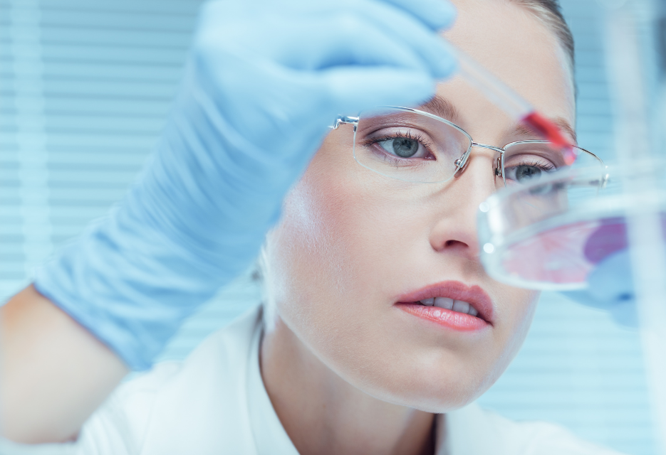 Scientist using pipette