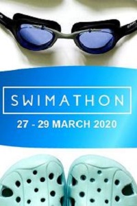 Swimming goggles, Swimathon banner and toes of Crocs 
