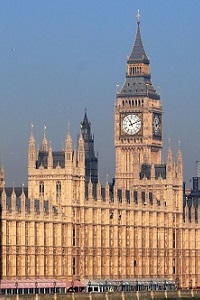 Palace of Westminster in sunlight with blue sky 