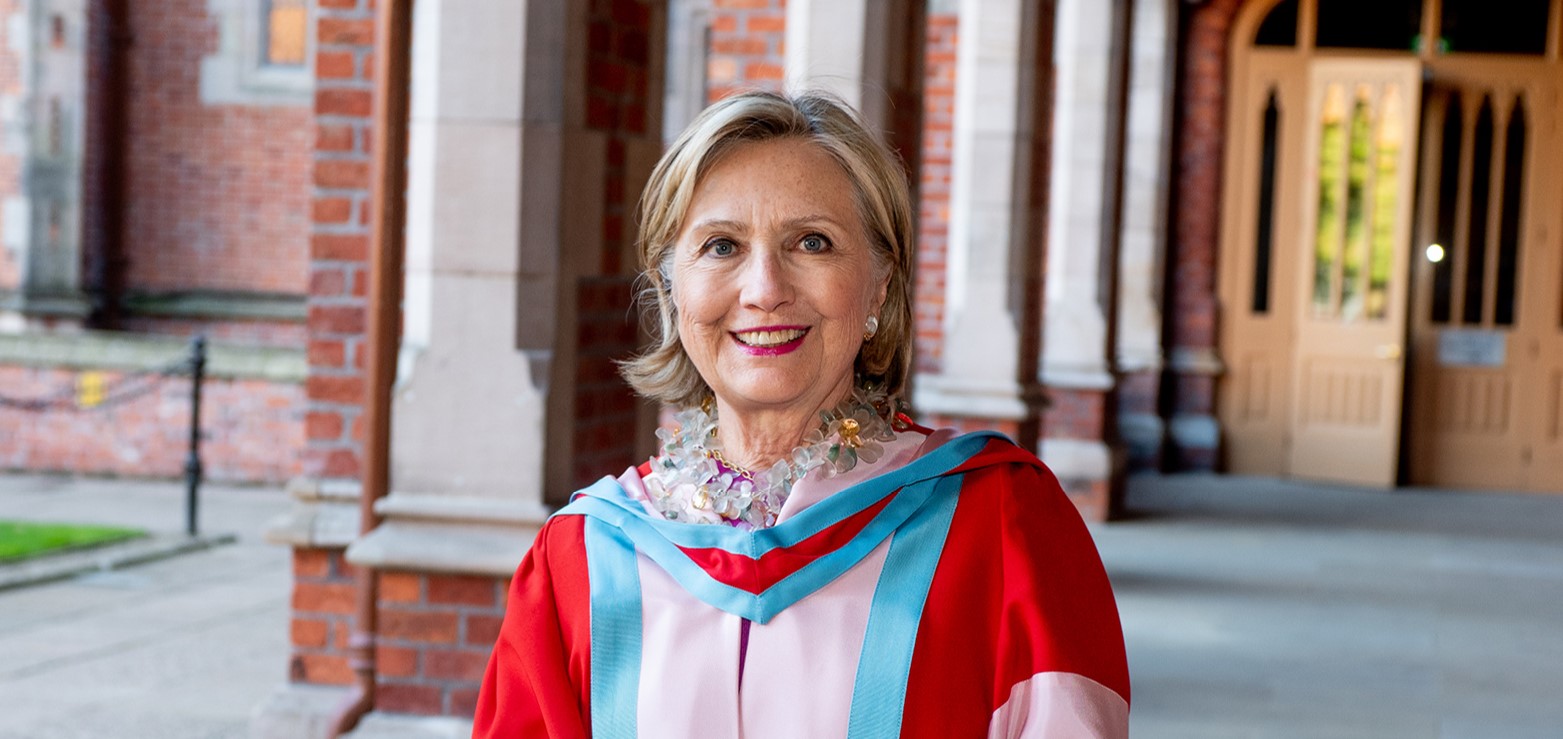 Chancellor Dr Hillary Clinton in formal robes in cloisters