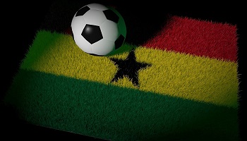 Football on astro turf in colours of flag of Ghana
